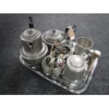 A tray of four piece hammered pewter tea service on tray, collector's spoons,