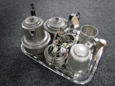 A tray of four piece hammered pewter tea service on tray, collector's spoons,