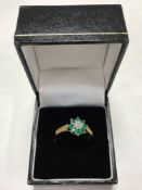 A 9ct gold cluster ring, size O.