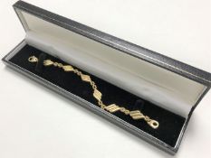 A 9ct gold fancy link bracelet, 10.2g.