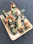 A tray of Capodimonte bisque figures CONDITION REPORT: Girl with dog - small loss to