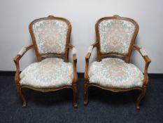 A pair of French salon armchairs,