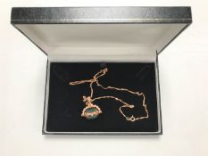 A 9ct rose gold necklace, 2.9g, together with a green agate swivel fob.