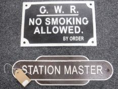 Two reproduction cast metal railway signs
