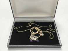 A fine 9ct gold necklace with 9ct gold double circle pendant (7.