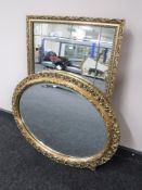 An oval gilt framed bevelled mirror together with another gilt framed mirror