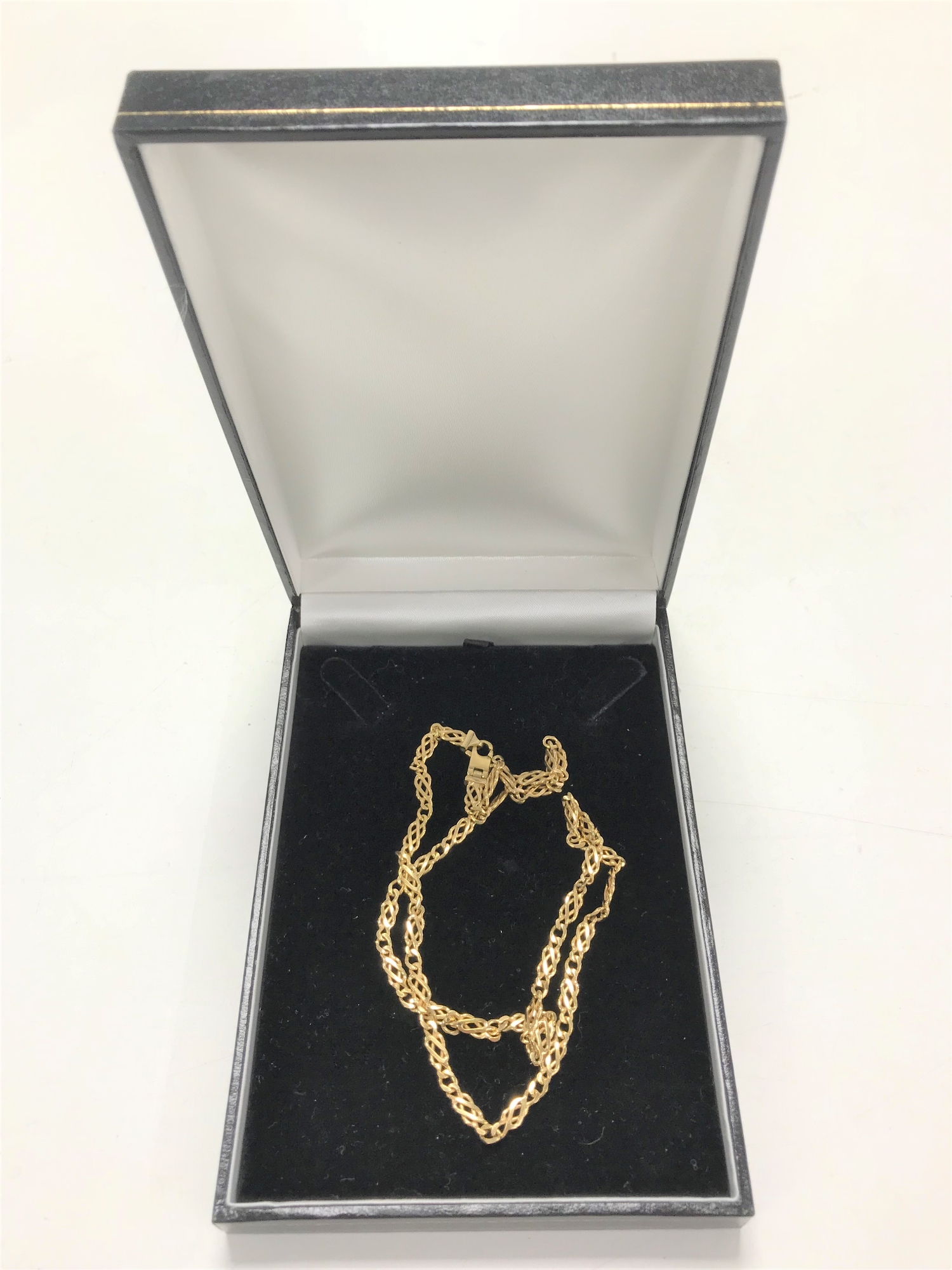 A 9ct gold flat linked necklace, 18.6g.