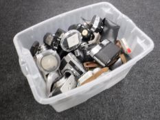 A box of vintage cameras and similar accessories including Konica, Agfa,