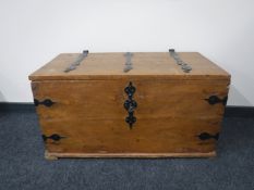 An antique pine shipping chest with metal fittings CONDITION REPORT: 95cm wide by