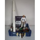 A basket of assorted Star Wars figures and collectables including a 12 '' Luke Sky Walker doll,