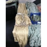 A pair of fully lined curtains with tie backs and swag,