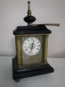 A German brass and marble mantel clock (missing a foot)