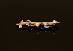 A 15ct gold five stone sapphire and diamond brooch