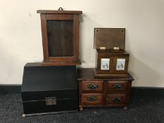 A miniature Edwardian four drawer chest together with a stained pine glazed door wall cabinet,