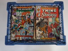 A basket containing approximately sixty 1970's and later Marvel comics