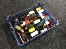 A basket containing Matchbox die cast delivery vans