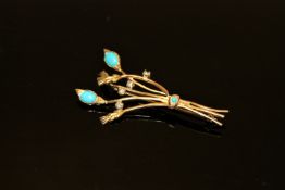 An 18ct gold diamond and turquoise floral spray brooch