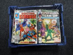 A basket containing approximately sixty 1970's and later Marvel comics