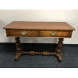 A Victorian mahogany console table fitted two drawers