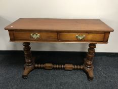 A Victorian mahogany console table fitted two drawers