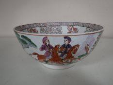 An early 20th century Oriental bowl depicting European figures hunting on horseback,