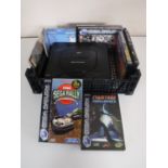 A box containing a Sega Saturn together with six boxed games,