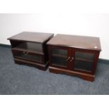 Two mahogany television stands