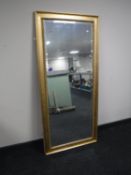 A gilt framed bevel edged hall mirror