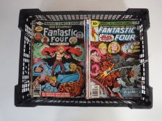 A basket containing approximately fifty 1980's and later Marvel comics