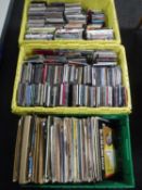 Three crates of assorted vinyl LP records, DVD's,