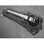 A vintage Jedson Les Paul style guitar in carry bag