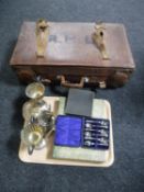 A vintage leather luggage case, tray of plated wares including cutlery, teaspoons, two trophies,