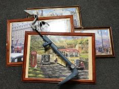 A metal detector and four framed jigsaw puzzles