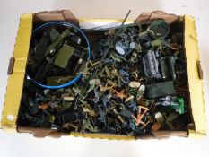 A box of plastic model soldiers together with a Meccano military construction set