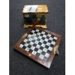 A Japanese folding chess set with pieces,