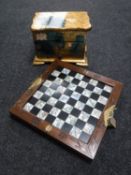 A Japanese folding chess set with pieces,