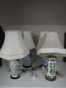 Four pottery table lamps with shades CONDITION REPORT: The blue and white examples