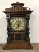 An oak mantel clock