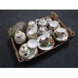 A box of two Japanese egg shell tea sets