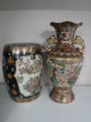 A Japanese twin-handled vase with geisha and flower decoration,