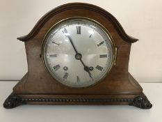 An Edwardian mahogany mantel clock with silvered dial