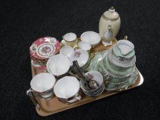 A tray containing a twelve-piece Doulton tea service,