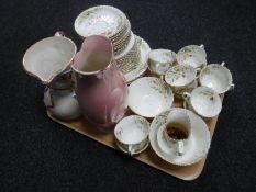 A tray containing a Victorian tea service together with a Maling lustre vase and an Arthur Wood jug
