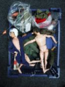 A basket containing 1970's Action men with clothes and accessories