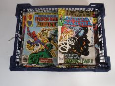 A basket containing approximately sixty 1970's and later Marvel comics