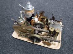 A tray of assorted copper ware, model cannons, brass miner's lamp,
