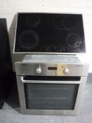 A AEG stainless steel wall oven with electric hob