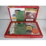 Two boxed Hornby railways electric train sets together with a further box containing track,