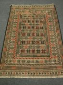 A needlework Sumak kilim rug,