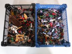 Two baskets containing mid twentieth century and later plastic soldiers including Loan Star Timpo